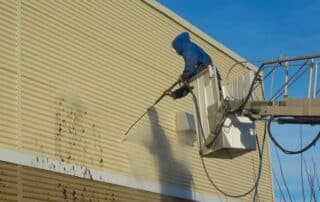 graffiti cleaning a wall with a water jet pressure professional washing