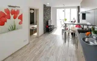 Modern apartment with upgraded flooring and kitchen.