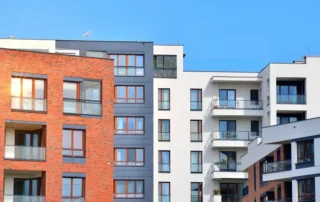 Apartments in residential complex. Housing structure at modern house. Architecture for property investment. and architecture details. Urban abstract - windows of apartment building.